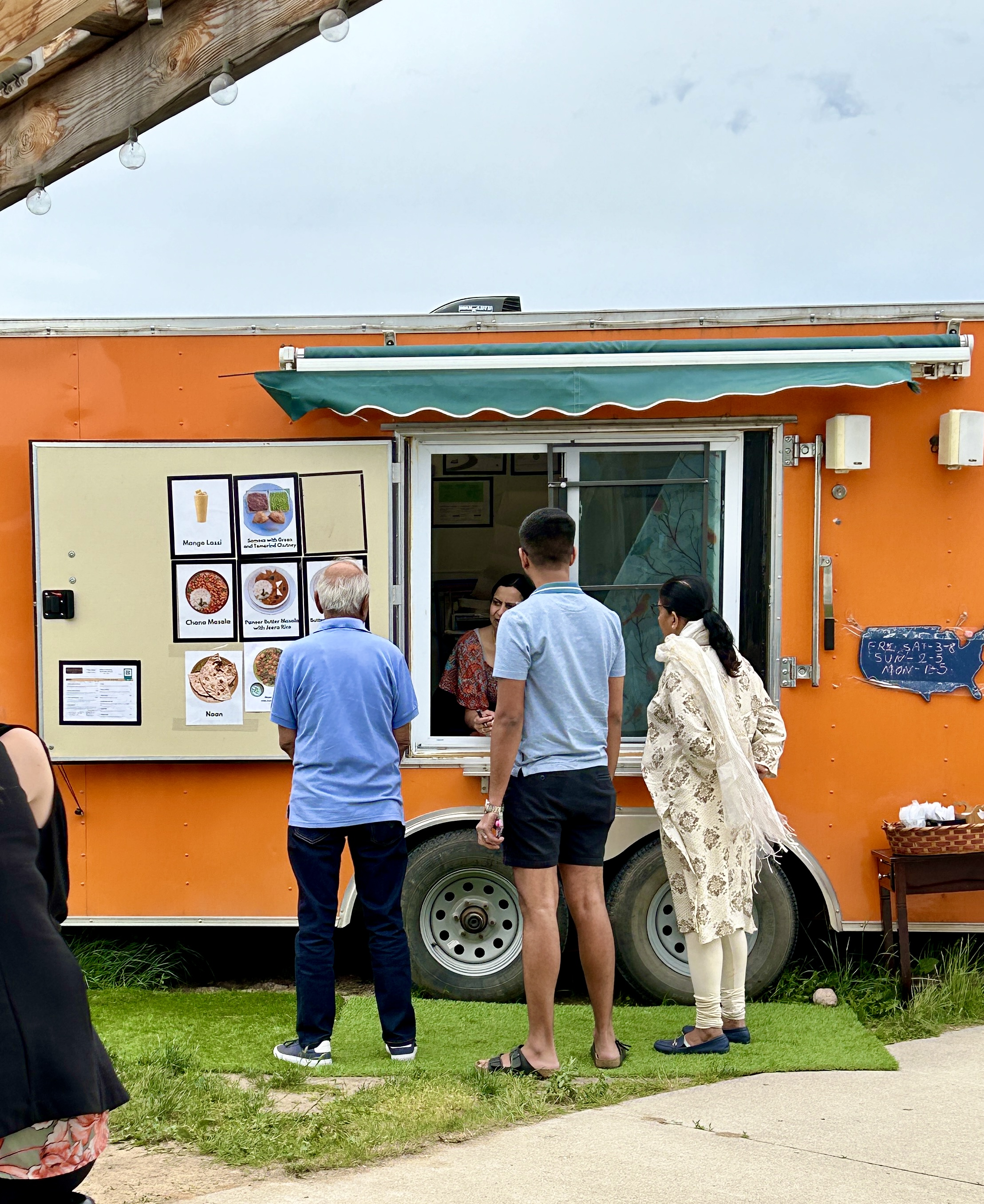 At the order window of the food trailer